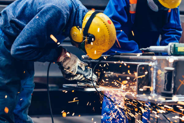 Photograph of welder manufacturing a MightyLoad heavy duty handling product in our UK factory